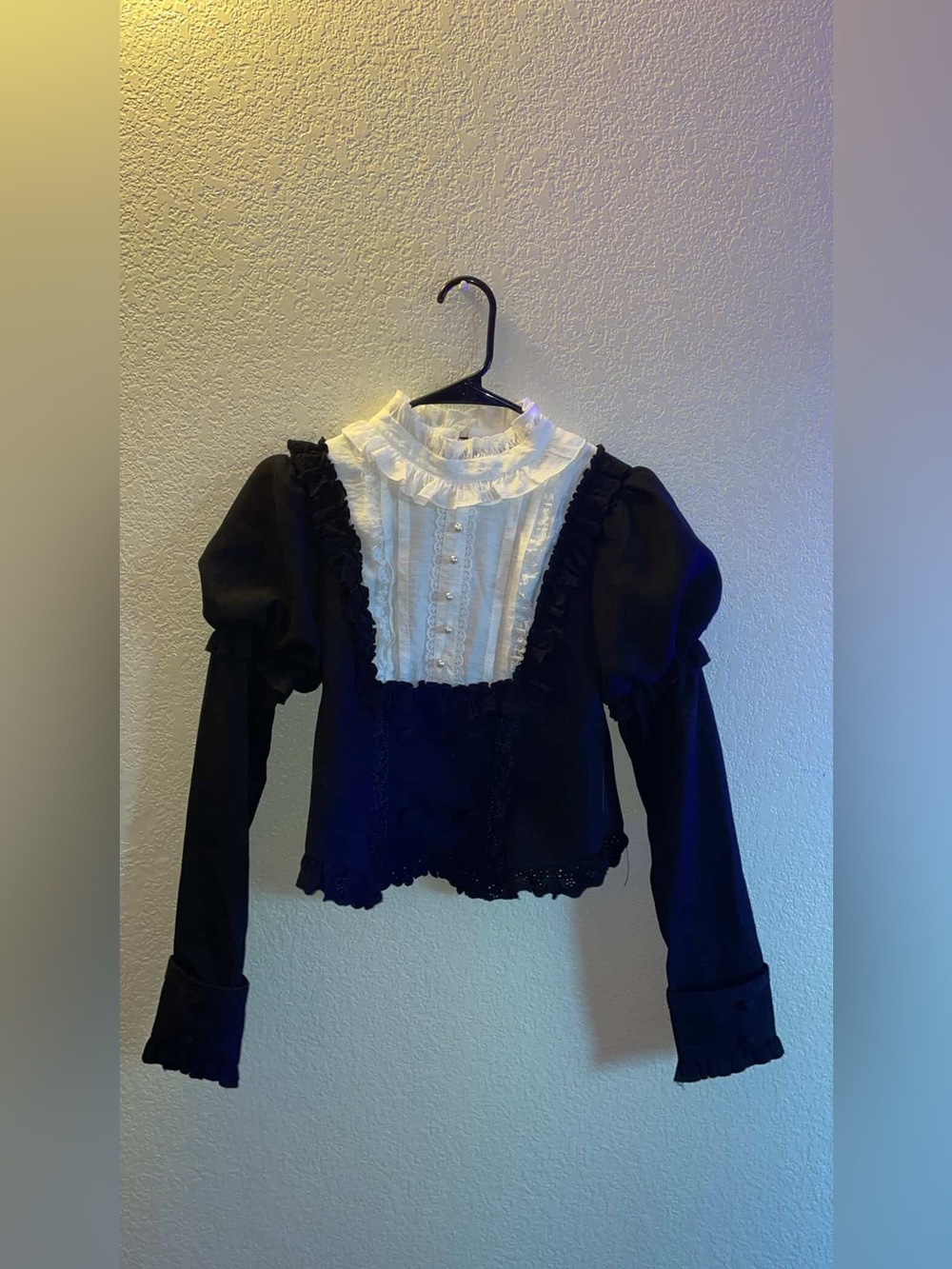 Victorian-Inspired Black Blouse with White Lace Bib